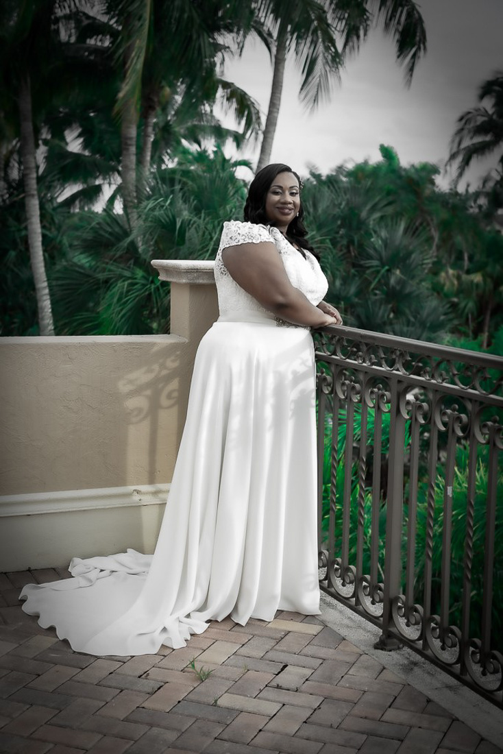 Couple walking on beach at sunset